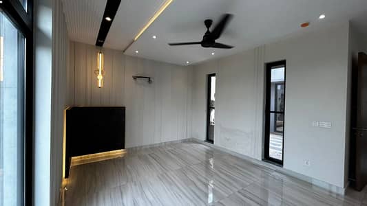 1 Kanal Full Basement 7-Bedroom Modern House For Rent in DHA Phase 7 Lahore Double-Height Lounge, Top Location Near DHA Raya, Golf Course & Carrefour Mall
