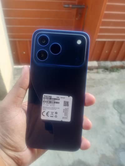 Tecno spark 50 6 128 7000mah betri