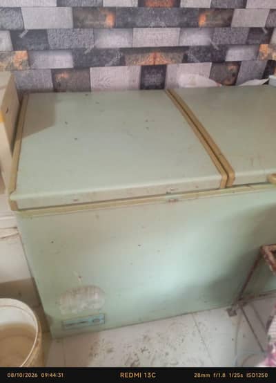 Haier company 2 door freezer available milk shop k lya tha