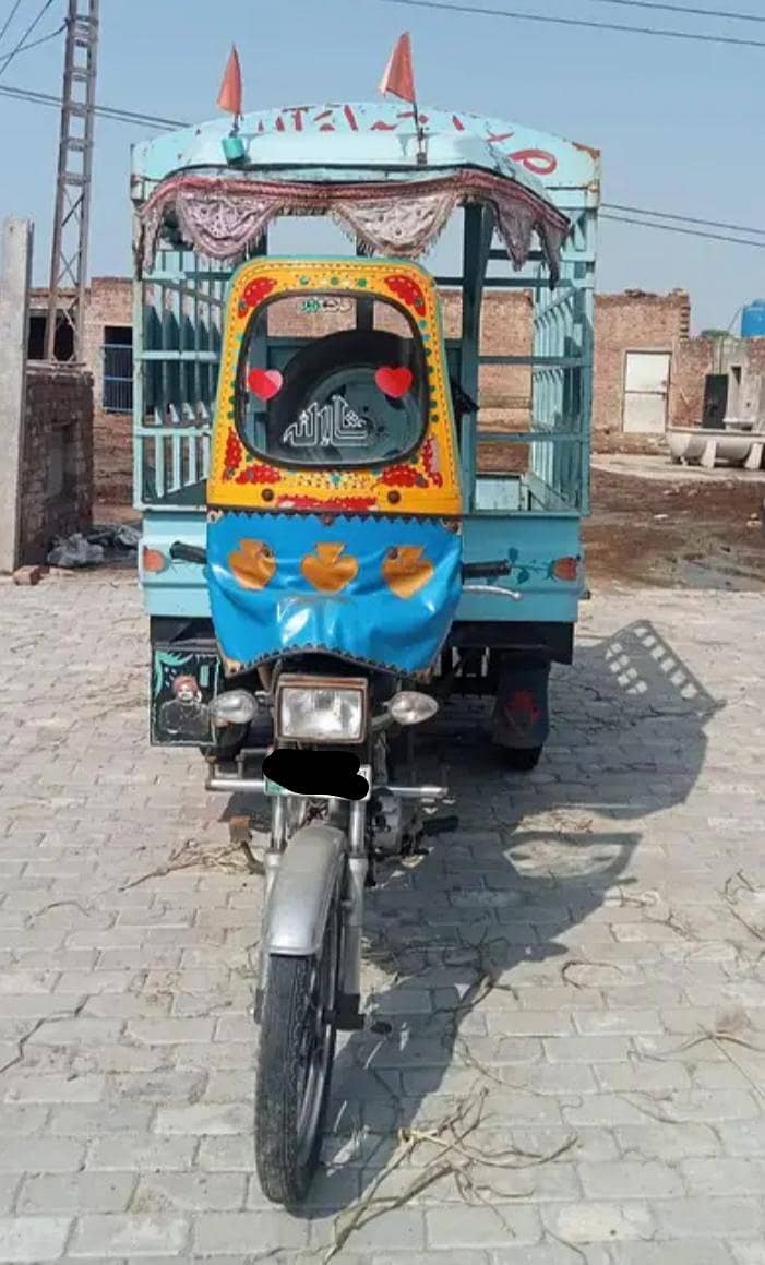 ریکارڈ لوڈر رکشہ 0