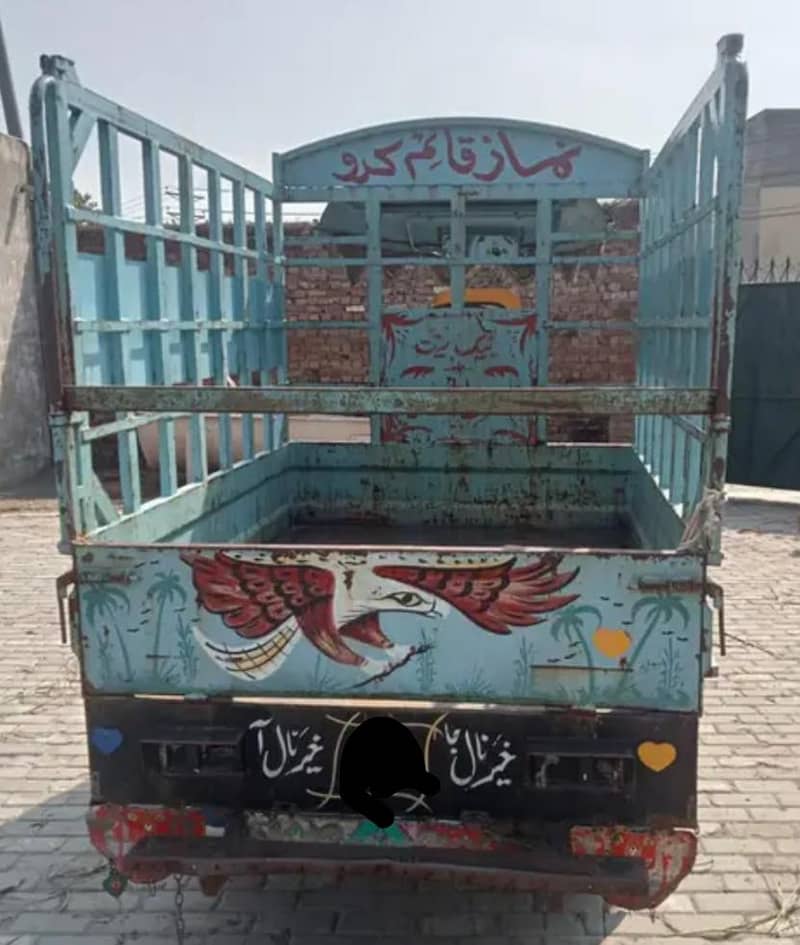 ریکارڈ لوڈر رکشہ 4