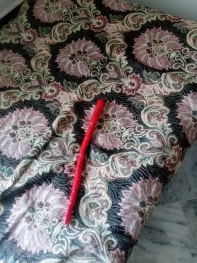 red tape wrapped training / craft rod