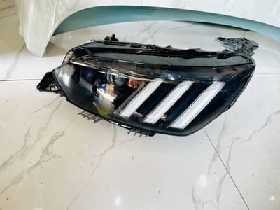 Peugeot 208 left headlight