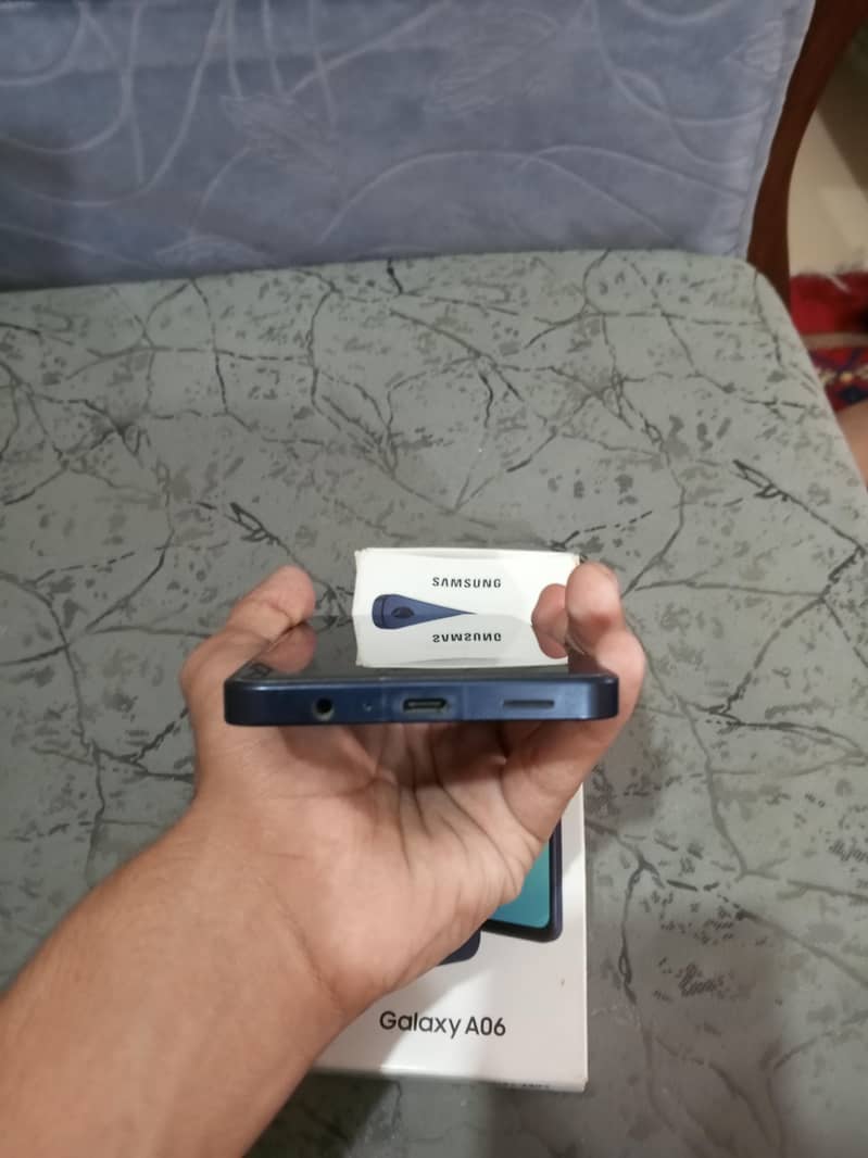 Samsung Mobile A06 5