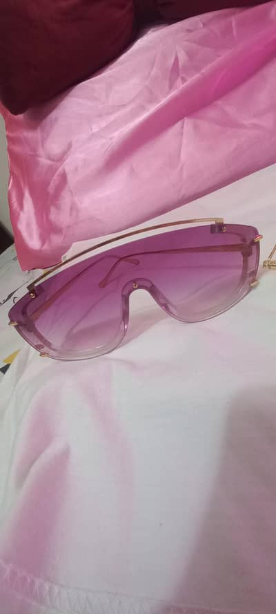 sunglasses  & one pink frame