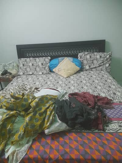 Wooden king size bed with matress in  good condition for sale