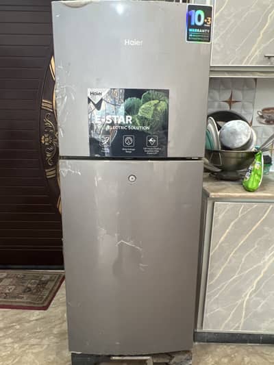 10/9 condition like new rap on fridge hailer fridge with warranty