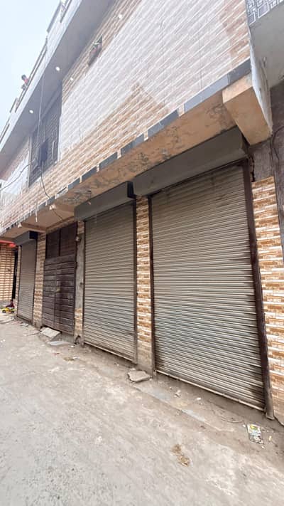 2 Marla House with 3 Shops | Corner Property | Best Investment