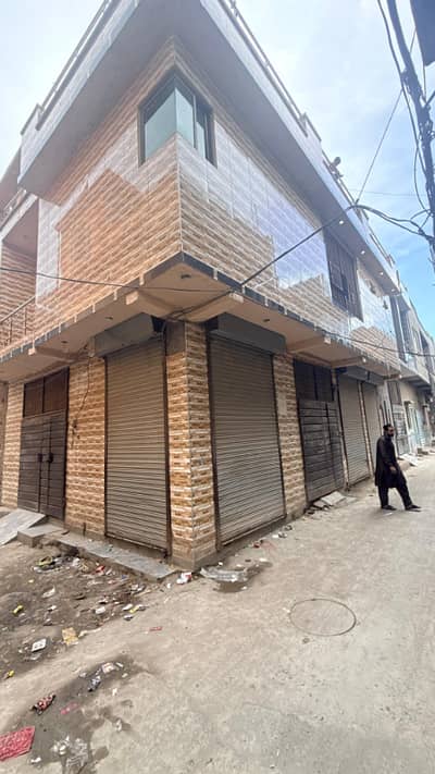 2 Marla House with 3 Shops | Corner Property | Best Investment