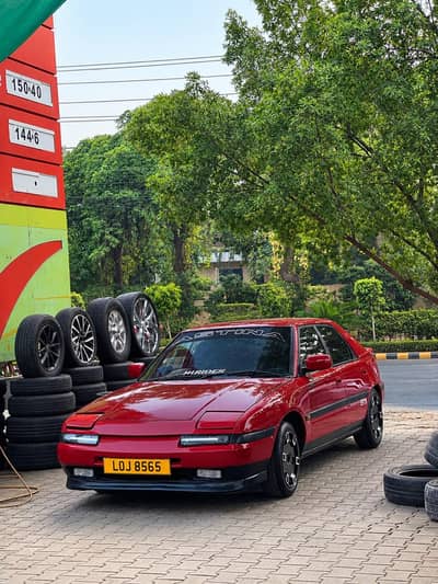 Mazda Astina 323 popup hatch