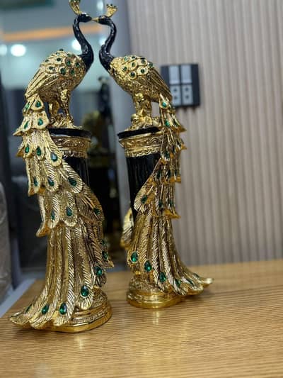 Pair of Black and Gold Peacock Statues