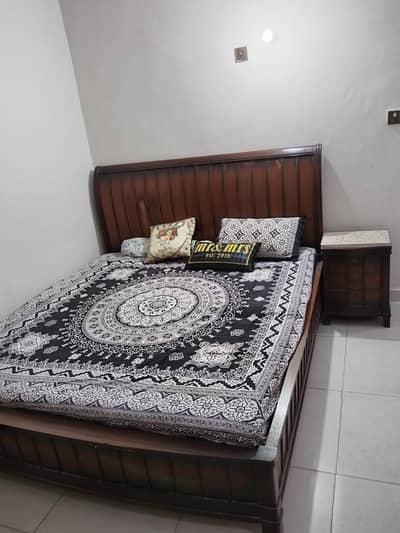 bed with 2 side tables