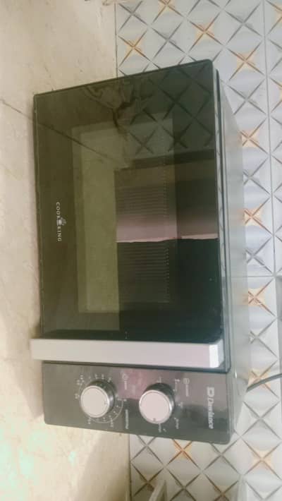 Slightly used microwave oven Dawlance DW-MD10
