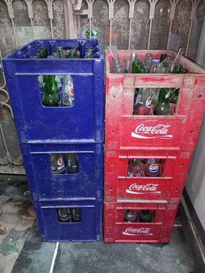 Empty Sheesha Pepsi and Coca Cola bottles with 6 plastic daalay