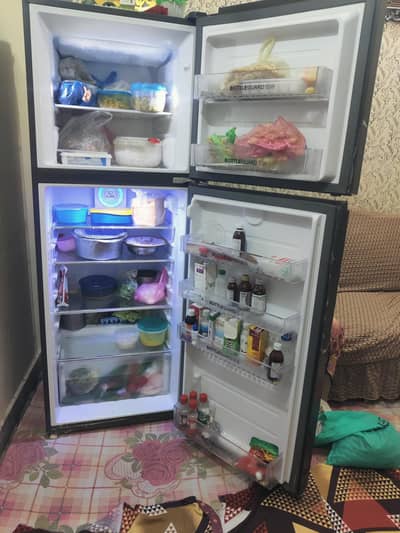 refrigerator is a 346 IP Red  model and used condition is 10 by 10.