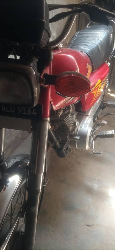 Honda united 2021 model for sale condition 10/8 Faisalabad namber
