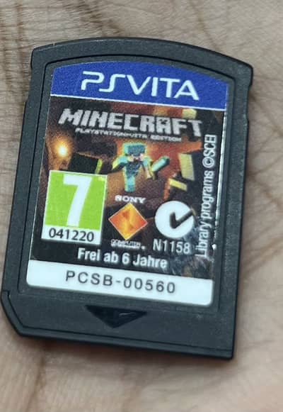Ps vita 1 oled thousand series  With Minecarft cd and 8gb memory card