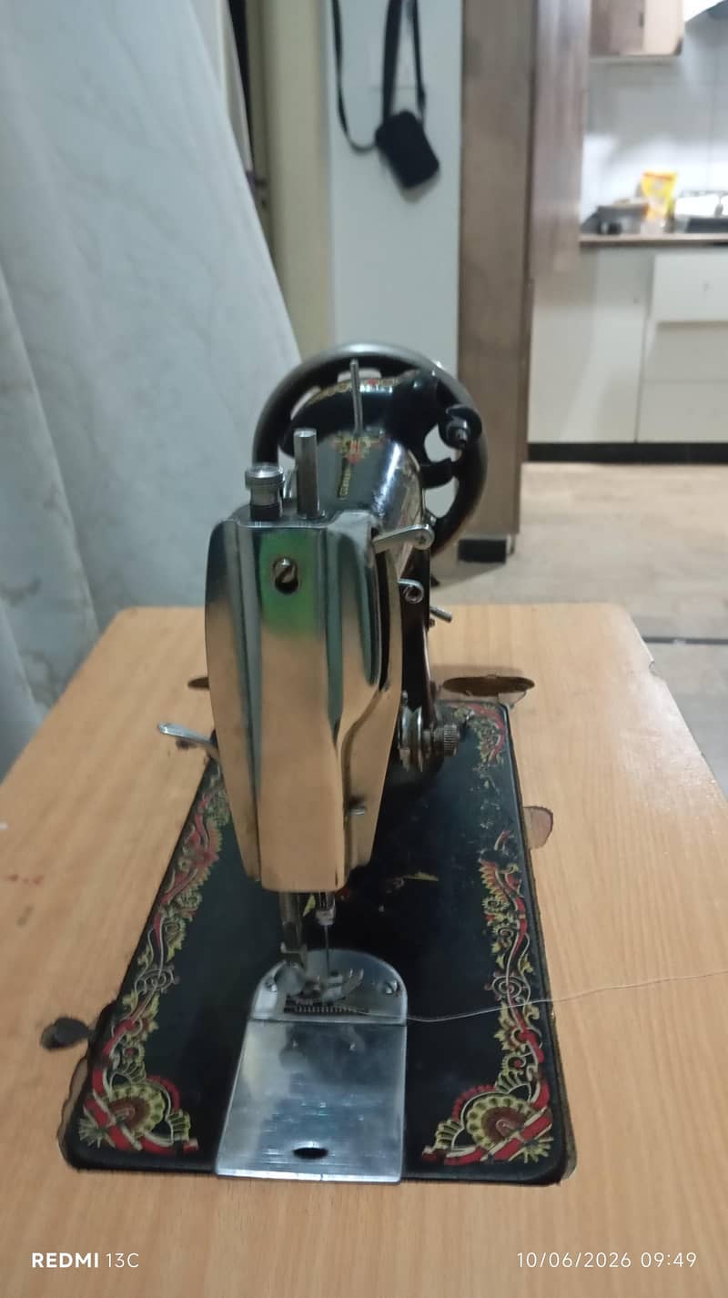 singer sewing machine and original singer pandel stand - Other ...