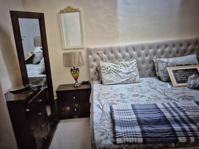 excellent bed with standing rotating dresser
