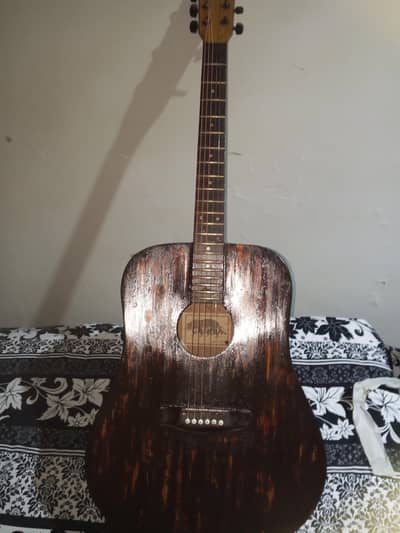 Jumbo size guitar for reasonable price