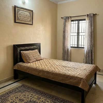 Single bed and double door cupboard