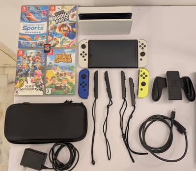 Nintendo Switch OLED bundle, extra joycons and 5 games