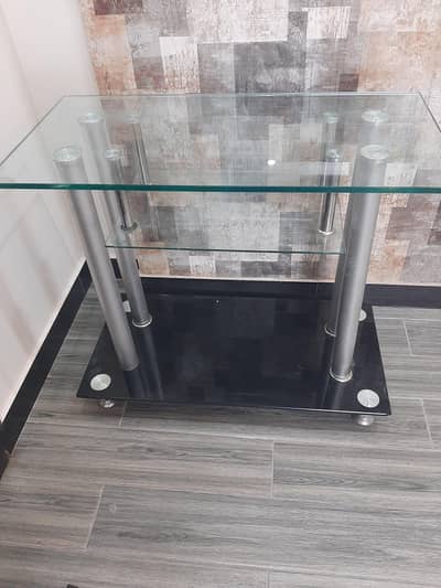 TV trolley of glass material in a very good condition