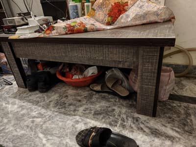 A coffee table, iron table and side table