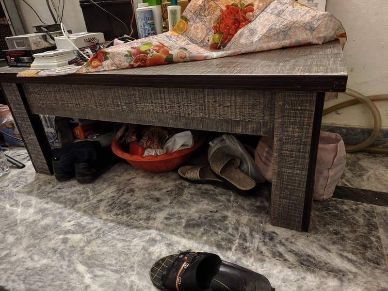 A coffee table, iron table and side table 0