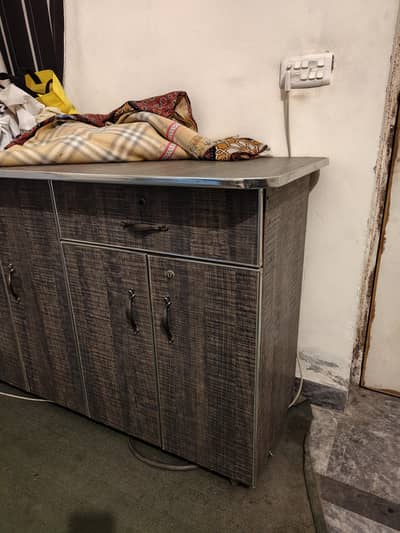 A coffee table, iron table and side table
