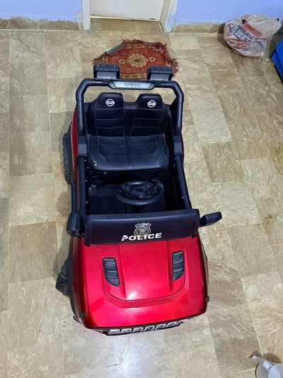 kids battery operated electric jeep car good condition ( with charger)