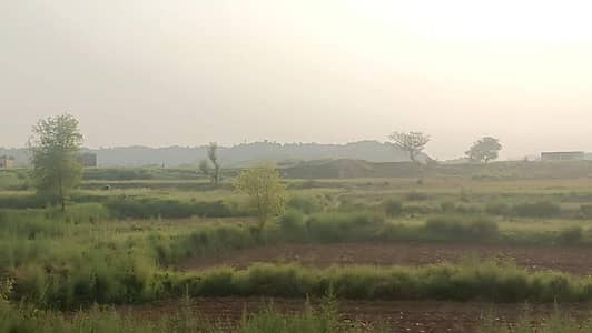 cheap land available nearly ring road adyala