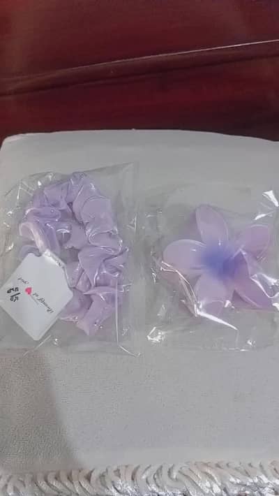 Purple scrunchie and claw clip