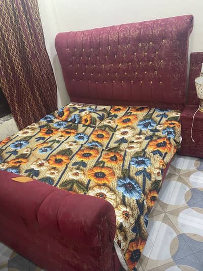 Its a family use bed with side tables and dressing table
