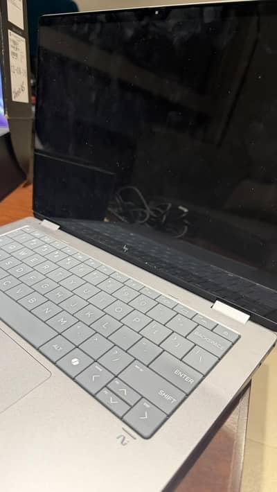 HP OmniBook X Flip 14 — 14” 2K touchscreen, 2-in-1.