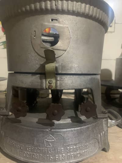 A vintage soviet aluminum stove from 20th century made USSR (3 wick)