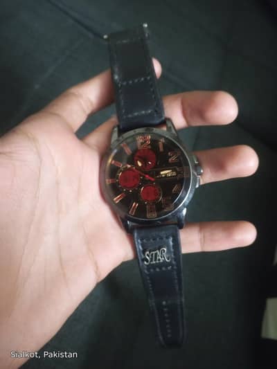Mens strap watch star with fancy dail