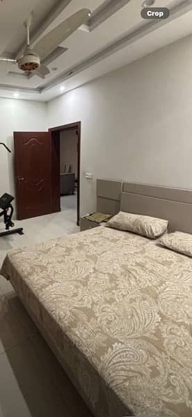 bed with side table hanging mirror and computer table 1
