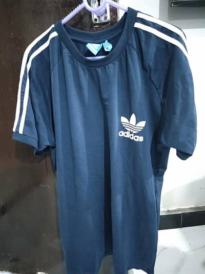 Tag new Adidas blue t-shirt