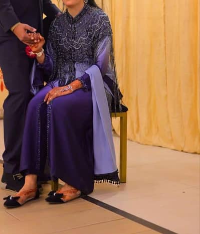 Royal Purple Silk Ensemble with Motiyaan Pochu party wear