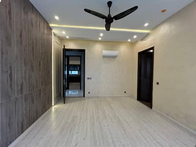 1 KANAL ELEGANT AND FULLY MAINTAINED NEW BUNGALOW IS AVAILABLE IN THE BEST BLOCK OF DHA LAHORE.