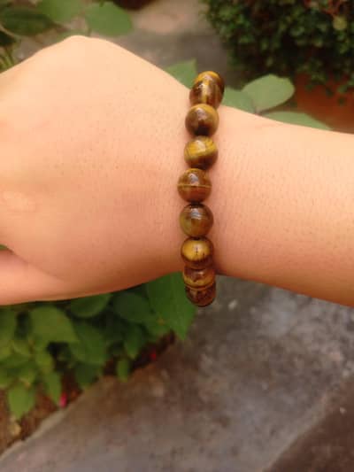 This bracelet features Tiger's Eye stones