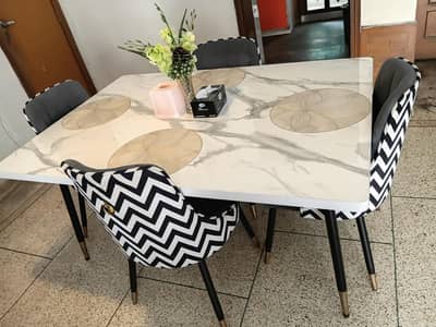brand new dining table with four  chairs  for sale
