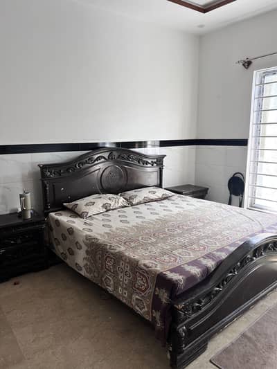 Bed with side tables