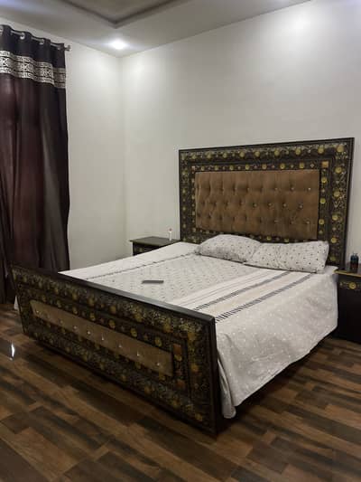 Based used bed clean condition with side tables attached lock set