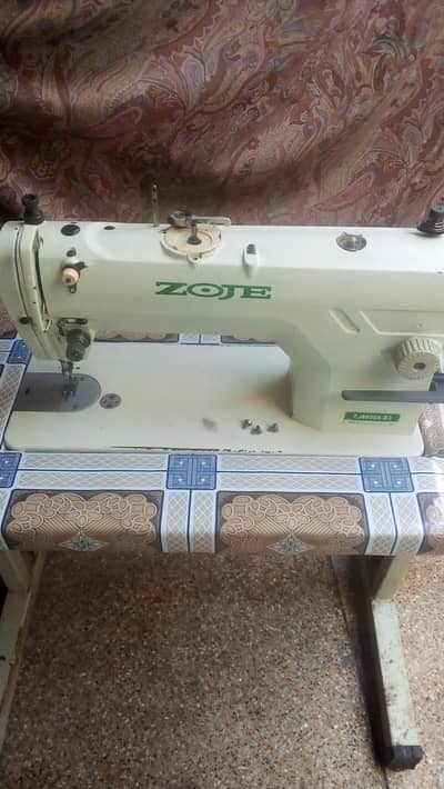 Zoje Sewing machine + Table stand + servo motor 39,500 Only