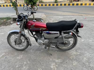 Honda 125 self start silver edition