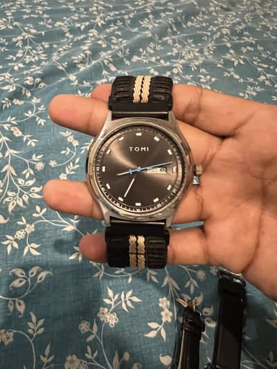 Tomi watch 2000 non negotiable rate 03213393464