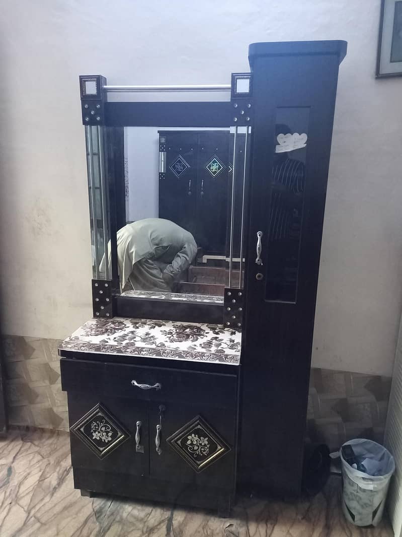 Bed , dressing table , clothes cable 1