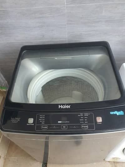 HAIER WASHING MACHINE 12 KG CAPACITY.       model:HWM12-1789